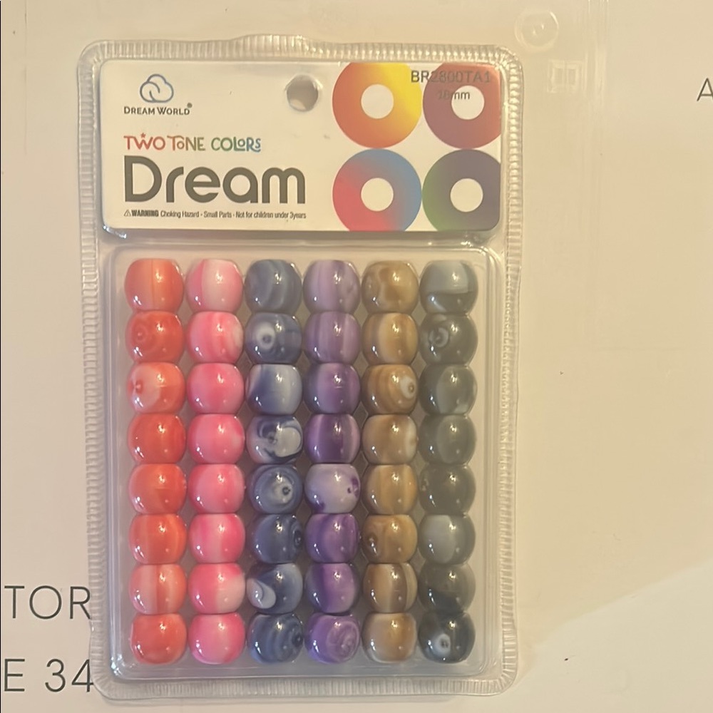 2 packs of hair beads, unopened.